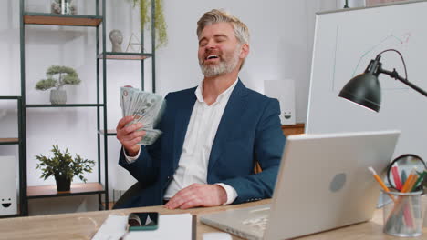 Rich-pleased-boss-businessman-waving-money-dollar-cash,-success-career-lottery-winner,-income-wealth