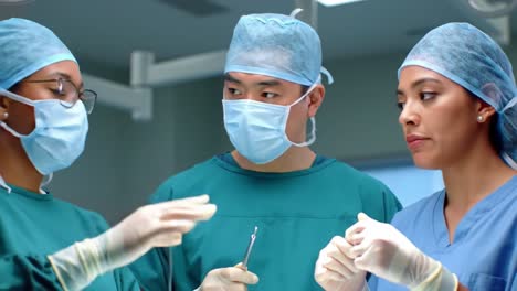 a collaborative surgical team in the operating room engages in intense communication while preparing for a critical procedure to ensure patient safety and success
