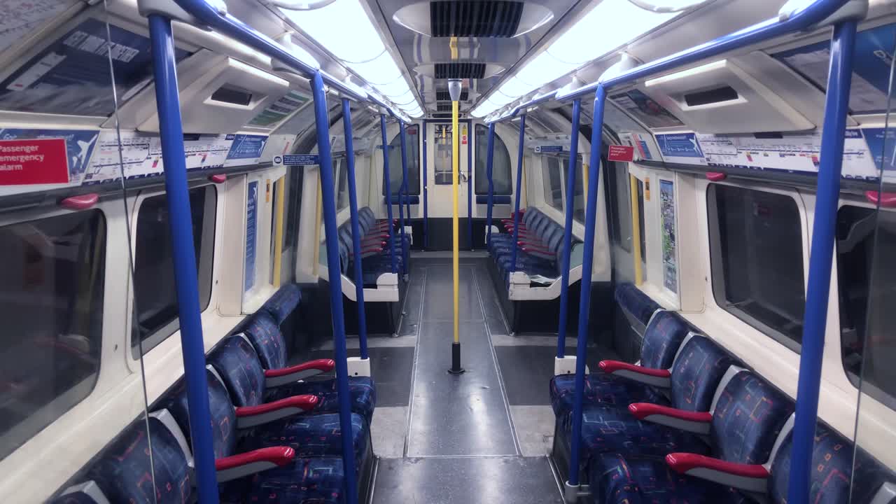 Inside view of an underground tube carriage with nobody and empty seats