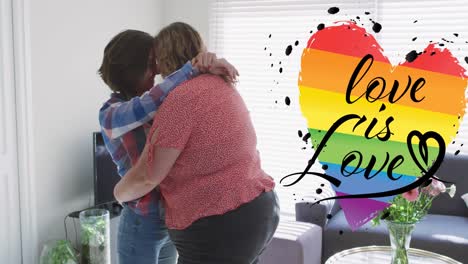 Animation-of-rainbow-heart-and-love-is-love-over-lesbian-couple-embracing-at-home