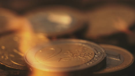 monedas en euros en llamas