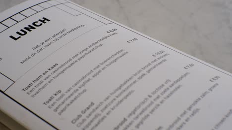 Close-Up-of-Lunch-Menu-Card-in-Dutch-Lunchroom