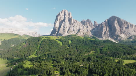 panoramic drone shot of langkofel mountain, dolomites, italy