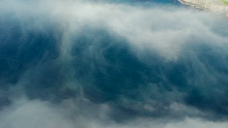 Aerial-Landscape-of-Djupfjord-Bridge,-Moskenes-Municipality,-Lofoten:-Sea-of-Clouds-and-Mountains