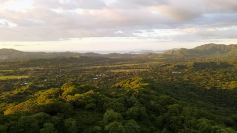 Tropical-nature-during-vibrant-sunset-discovered-from-above