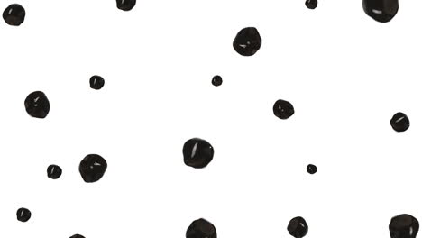 white background, various forms of black tapioca balls rolling suspended in the air