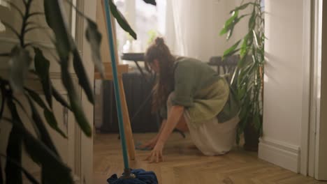 woman cleaning a home studio