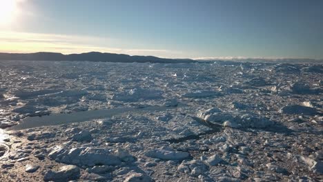 aerial view of the impressive ice fiord surrounding ilulissat, greenland