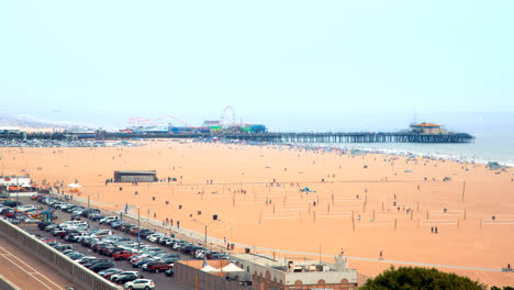 A-4K-time-lapse-of-the-Santa-Monica-Pier-from-a-distance-in-Santa-Monica,-California,-USA-on-09-01-2019