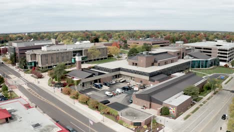 lansing community college in lansing, michigan drone video of campus moving forward