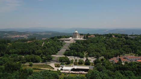 braga's sameiro sanctuary aerial fly-over amid lush forests