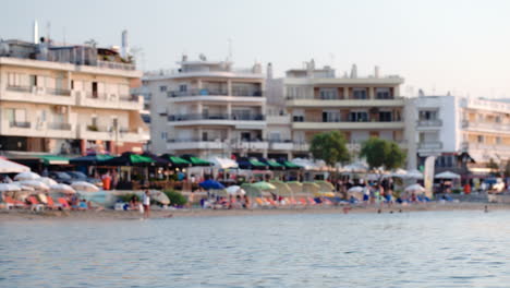 Summer-resort-with-people-resting-on-beach