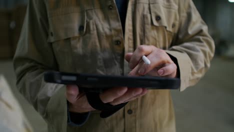 warehouse worker inspecting inventory