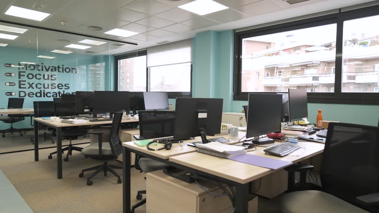 Interior of bright creative workspace with computer desks