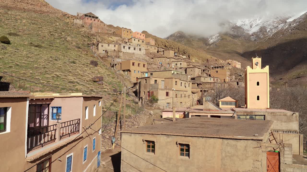 The simple stone houses of the mountain village are arranged around small courtyards, with views of the snow-capped Toubkal peaks visible from every corner of Morocco’s landscape
