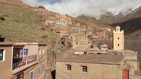 the simple stone houses of the mountain village are arranged around small courtyards, with views of the snow-capped toubkal peaks visible from every corner of morocco’s landscape