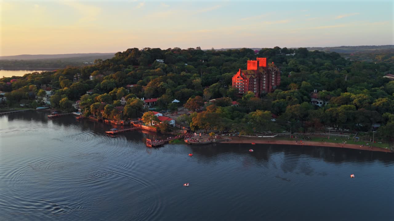 Aerial View of Hotel Condovac, Abandoned Hotel With La Rotonda Beach By Ypacarai Lake In San Bernardino, Paraguay