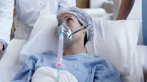 female patient receiving artificial ventilation