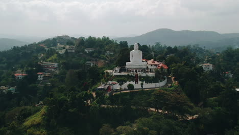 Aerial-of-Big-White-Buddha-statue-in-Kandy