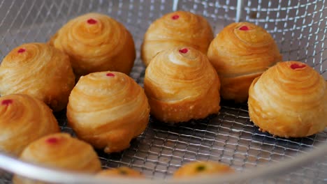 preparation of puff pastry dough for the fried chinese pastry.