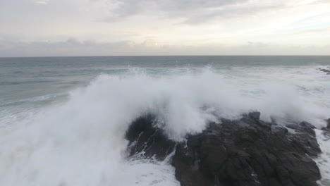 cinematic aerial footage of coffee bay in south africa at sunrise