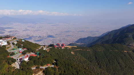 panoramic drone shot overlooking the city of kathmandu from chandragiri, nepal