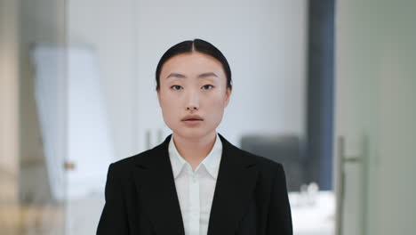 asian businesswoman in office setting