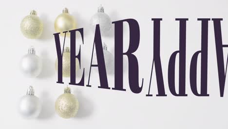 animation of merry christmas text banner against decorative baubles on white surface