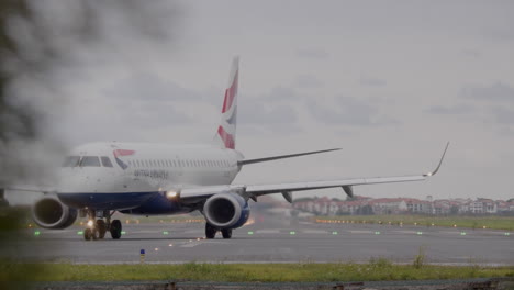 british airways airplane taxiing on runway