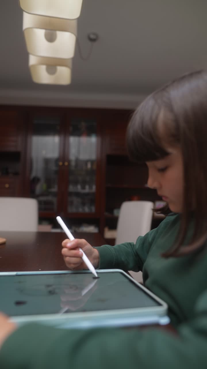 Girl Drawing on a Digital Tablet