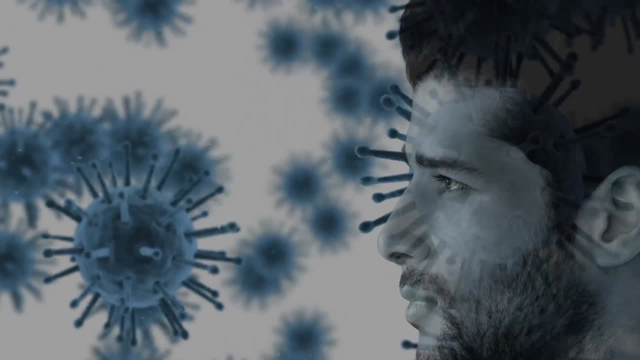 Animation of a Caucasian man profile over Covid-19 cells in the background.