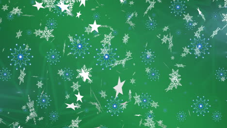 Animation of christmas snow flakes falling over green background