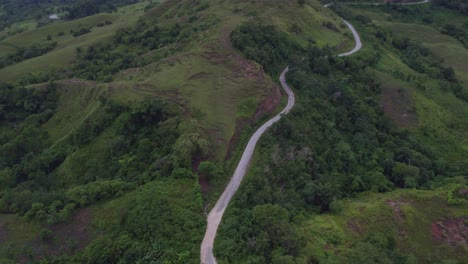 The-famous-green-lush-Lapale-Hills-at-Sumba-island-during-sunset,-aerial