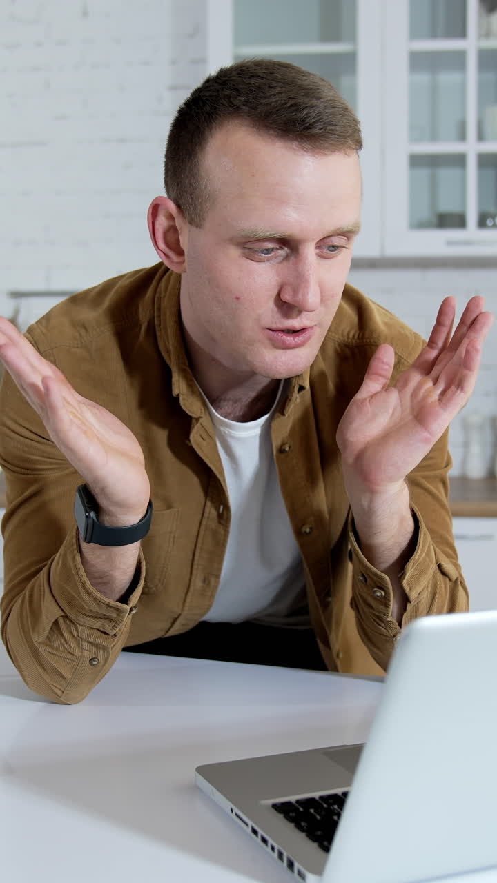 Handsome man have a business conference at home. Quarantine business meeting. Vertical video