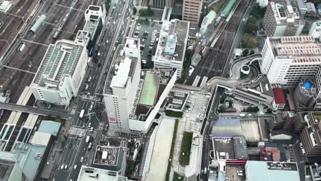 high angle view of osaka, japan, featuring buildings, transportation infrastructure, and urban landscape