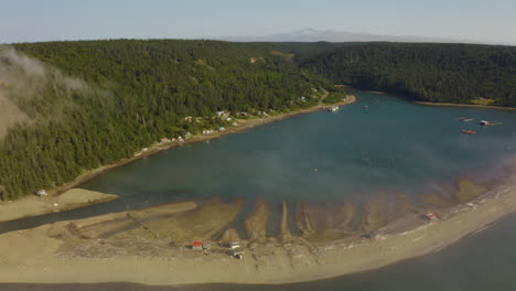 mist rises up the hills along the atlantic coast of the canadian maritimes