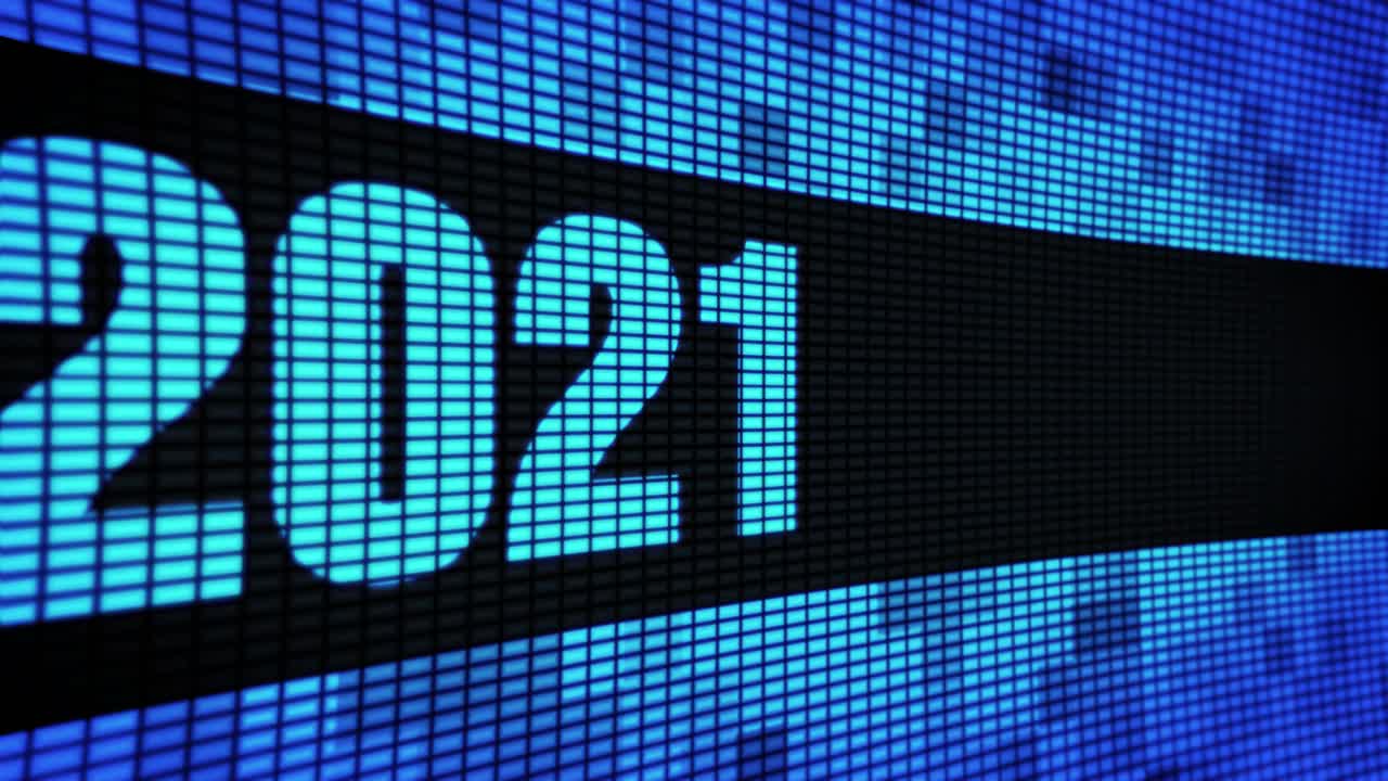 Year 2021 and 2020 displayed on a LED screen