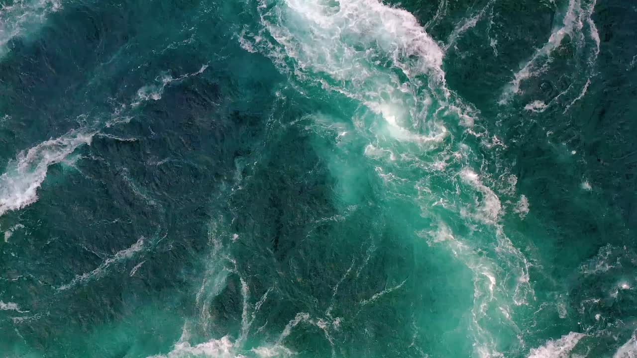 Waves of water of the river and the sea meet each other during high tide and low tide.