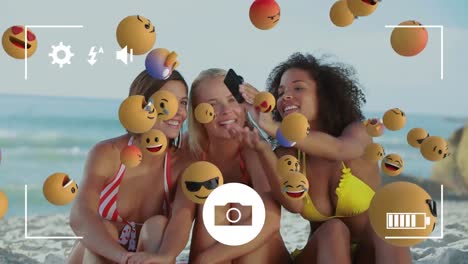 emoji icons with friends taking a selfie in the background