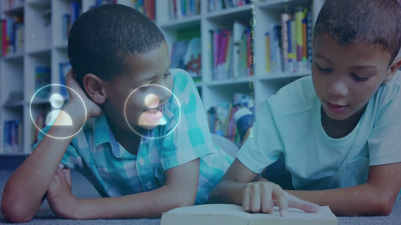 Two boys lying in library, finger tracking text while initiating education UI appearing over book
