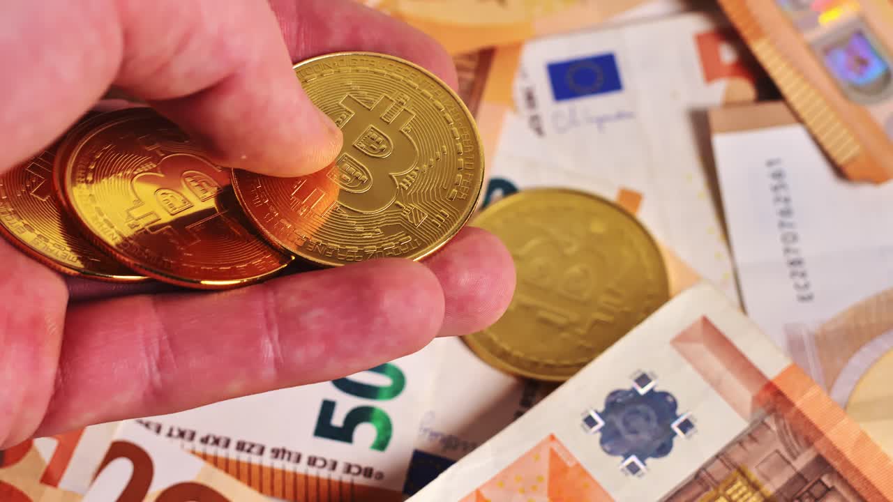 Golden Bitcoin coins with euro notes symbolizing digital economy and transition