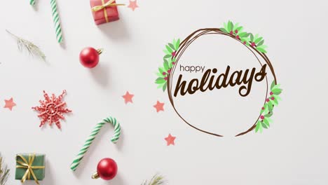 animation of christmas greetings text over decorations