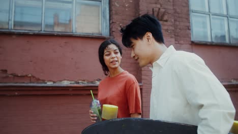 couple enjoying drinks outside