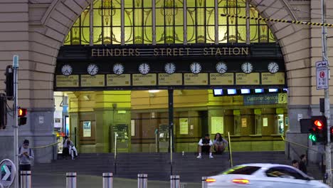 australia's landmarks eerily quiet during coronavirus (covid-19) outbreak. outside melbourne's (usually bustling) flinders street station in the evening.