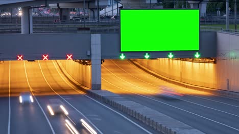large green screen billboard on a busy highway with traffic, timelapse, moscow, russia