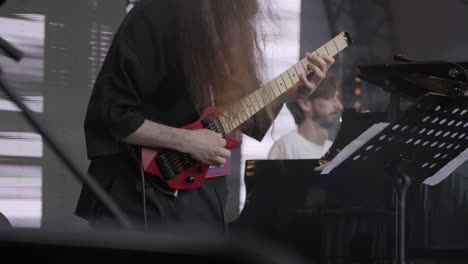 guitarist performing live on stage