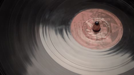 ancient vinyl rotating on a turntable. close up