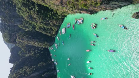 VERTICAL,-Surreal-Water-Color-of-Pileh-Lagoon-in-Phi-Phi-Thailand,-Drone-View