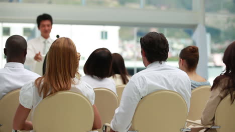 businessman giving a speech