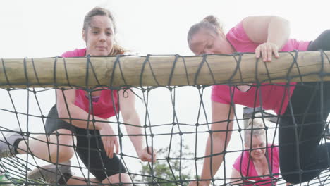 female friends enjoying exercising at boot camp together